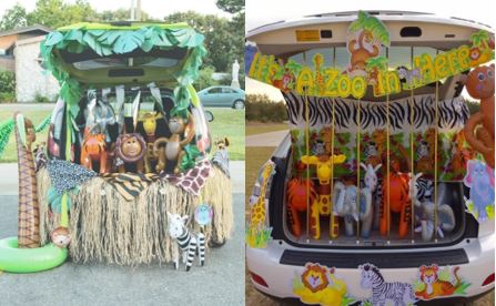 Open trunk with various zoo animals and greenery